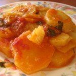 Stewed potatoes with tomato sauce