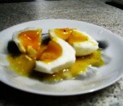 Boiled eggs in lemon oil sauce